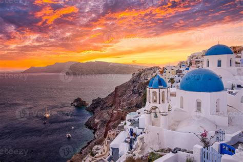 Amazing evening view of Santorini island. Picturesque spring sunset on the famous Oia, Greece ...