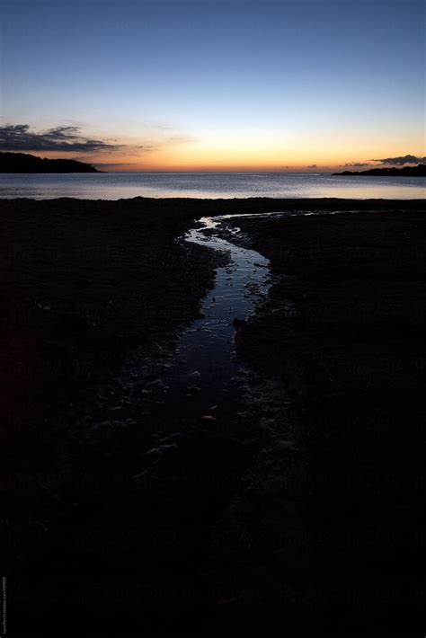 "Beach At Sunrise" by Stocksy Contributor "Sky-Blue Creative" - Stocksy