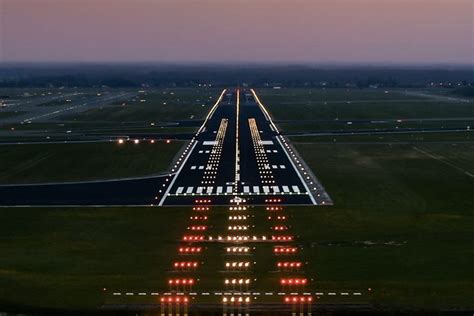 Just light runway markings, runway lighting is spaced at defined intervals. Here's how they're ...