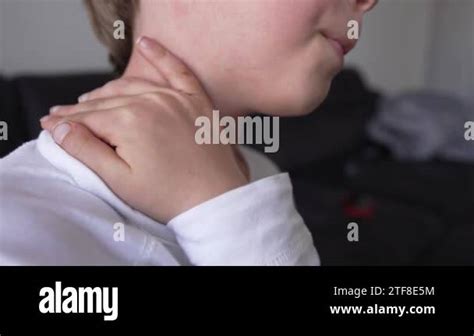 Allergic skin reaction on the childs neck and face - red rash. Symptoms of photodermatitis ...