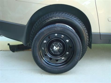 Lowering the Spare Tire on a Chevrolet Traverse | Chevrolet traverse, Spare tire, Car wheel