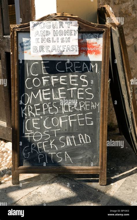 Taverna menu blackboards, Rhodes, Greece Stock Photo - Alamy