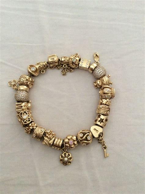 Pandora Gold Bracelet & beads. | Pandora bracelet gold, Pandora ...