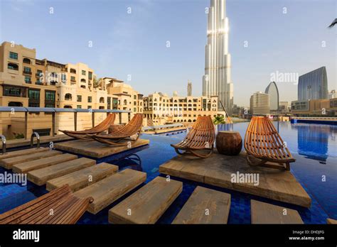 Burj Khalifa seen from hotel swimming pool, Dubai, United Arab Emirates, Middle East Stock Photo ...