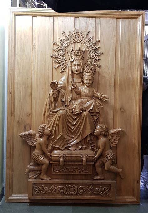 Wooden carved panel of our lady of Arabia | Công giáo