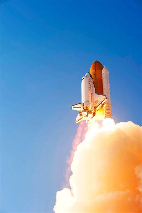 Discovery lifts off from Launch Pad 39A at NASA's Kennedy Space Center ...