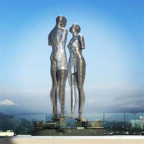 Moving Statues Of A Man And Woman Pass Through Each Other Daily, Symbolizing Tragic Love Story ...