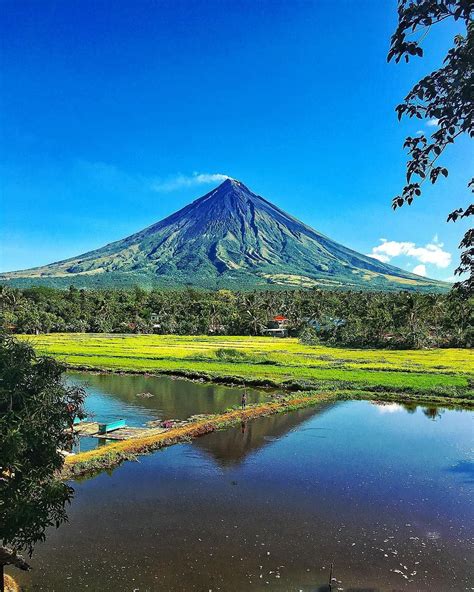 There is something magical about Mayon Volcano in Bicol Philippines - it is huge and magnificent ...