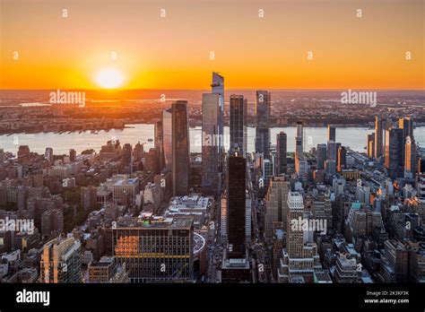 Aerial view of Hudson Yards and Midtown Manhattan skyline at sunset ...