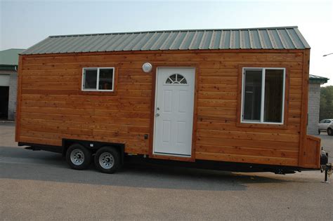 24' tiny house on wheels, cedar lap siding, forest green roof. RV by Tiny Idahomes | Tiny house ...