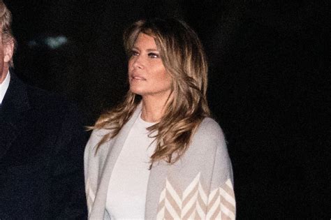 Melania Trump Wears Patterned Coat + White Boots at the White House ...