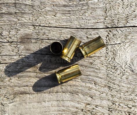 Empty pistol bullet shells stock photo. Image of metal - 20595938