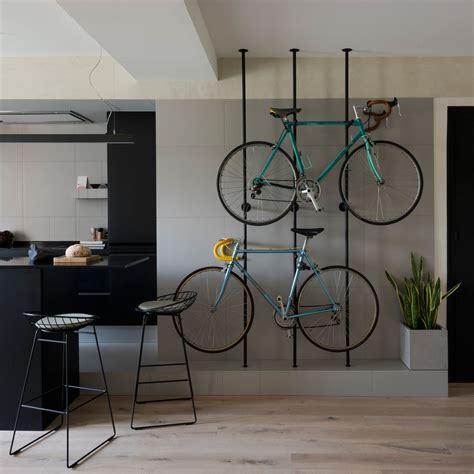 Bespoke storage creates room for bicycles in renovated Barcelona flat ...