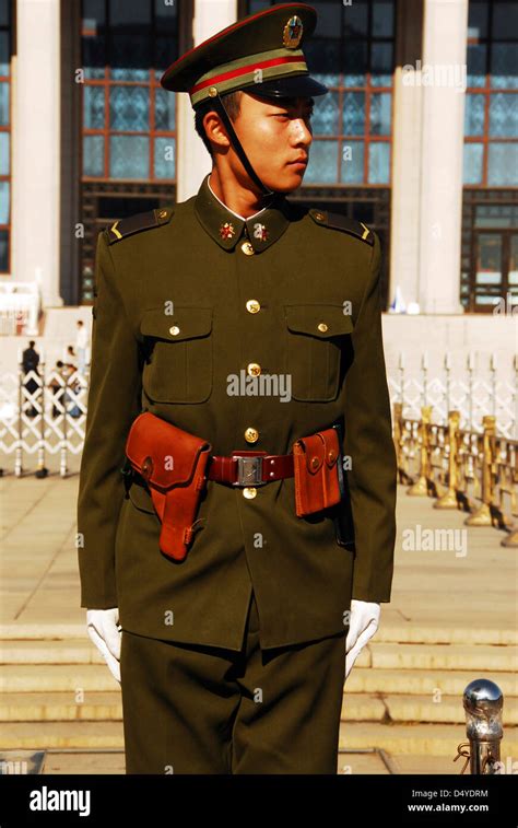 China, Beijing, Chinese guard in military uniform with a gun holster in ...