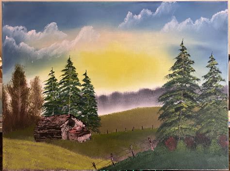 My 3rd time painting ever. Bob Ross Cabin at Sunset. Added a few clouds for the first time too ...