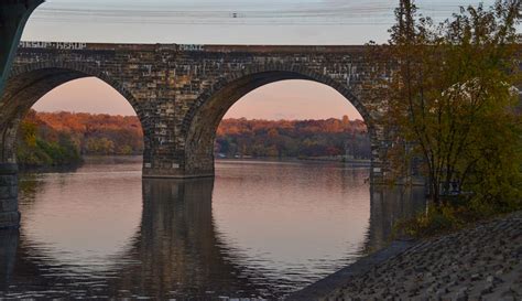 Schuylkill River Railroad Bridge in Autumn Photograph by Bill Cannon ...