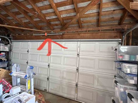 electrical - Can I run cable through the center of my garage door header? - Home Improvement ...