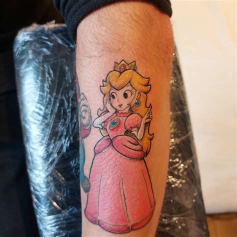 21 Princess Peach Tattoos To Showcase Your Love Of Mario • Body Artifact