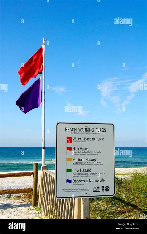 Florida Beach warning flag sign Stock Photo - Alamy