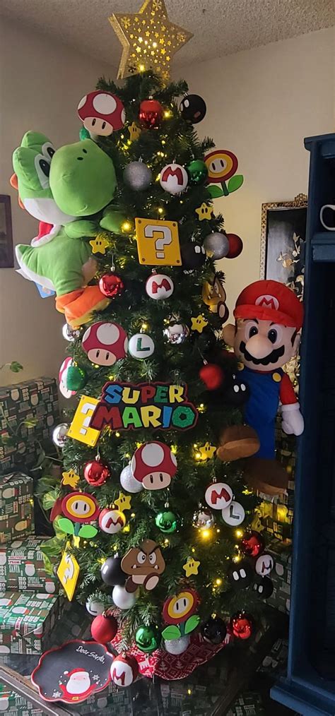 a christmas tree with mario and luigi characters on it