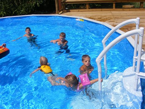 Blessed By A Child: A pool full of kids....2 pools full of kids....3 if you count the baby pool :)