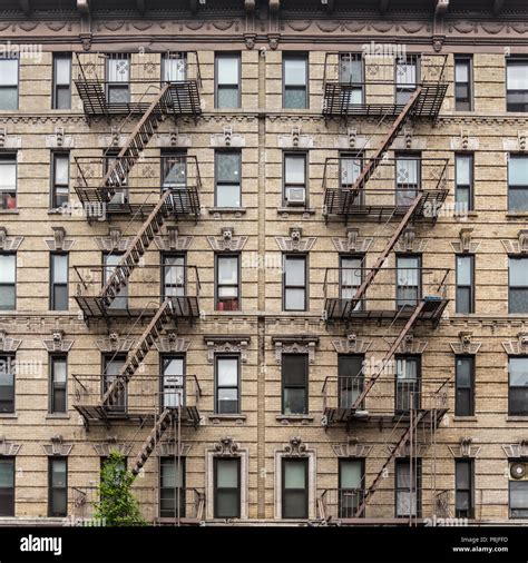 A fire escape of an apartment building in New York city Stock Photo - Alamy