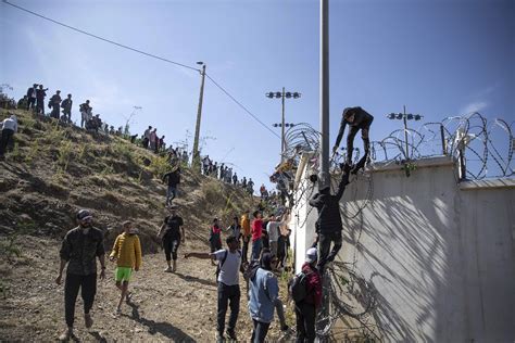 Migrant surge on Spain-Morocco border brings more suffering | AP News