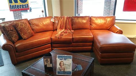 Old-World Tan Saddle Color. Customize this sectional to be L-shaped, rounded, or simply be a ...