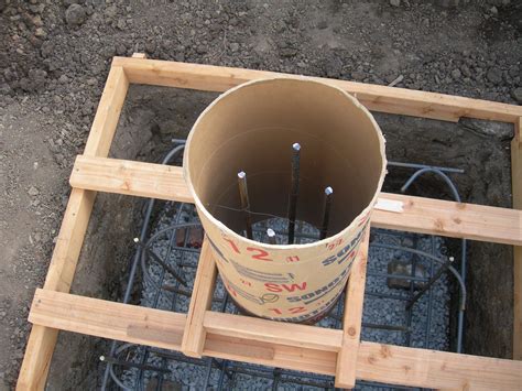 Sonotube rebar and bracing | Concrete footings, Concrete deck, Rebar