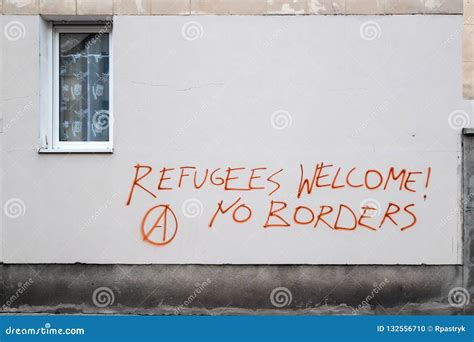 Refugees Welcome Graffiti in on the Wall in Warsaw Editorial Image ...