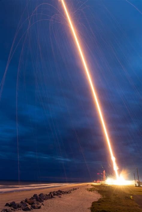 NASA rocket launch sparks stunning green and violet clouds in night sky (photos) | Space