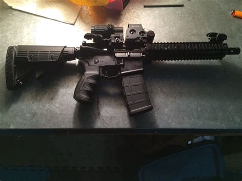 Here is my not so simple DD MK18. Eotech holographic with magnifier, ATI Grip and stock, and 45 ...