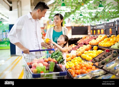 Family shopping in supermarket Stock Photo - Alamy