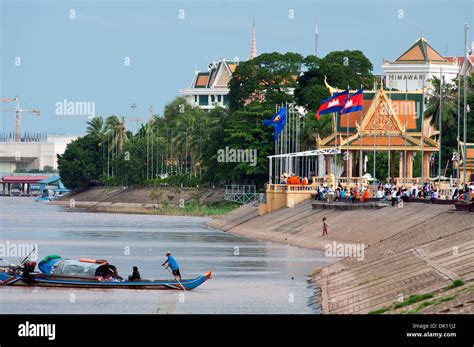 riverfront scene with Royal Palace river shrine, Phnom Penh, Cambodia ...