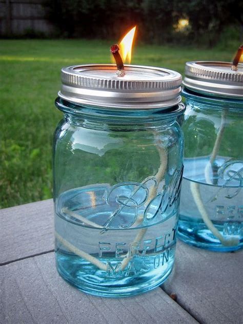 DIY oil lamps using a vintage Ball pint jar and 1/8" cotton wicks (8"long). Small bird writes ...