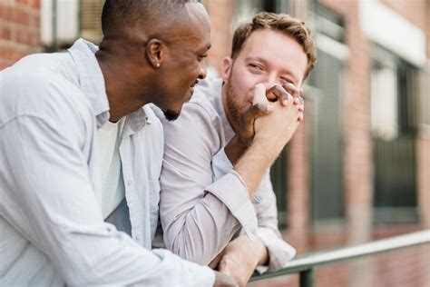 Smiling Men Holding Hands · Free Stock Photo