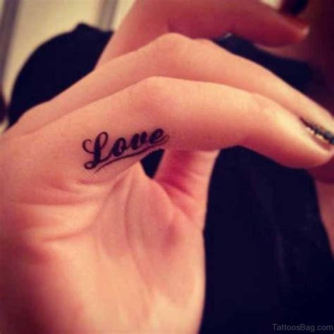 52 Inspiring Love Tattoos On Fingers - Tattoo Designs – TattoosBag.com