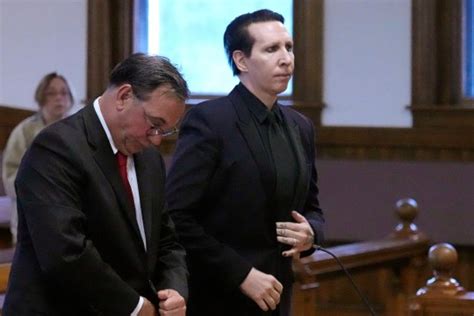 Marilyn Manson 'settles' rape lawsuit a week before trial due to begin ...