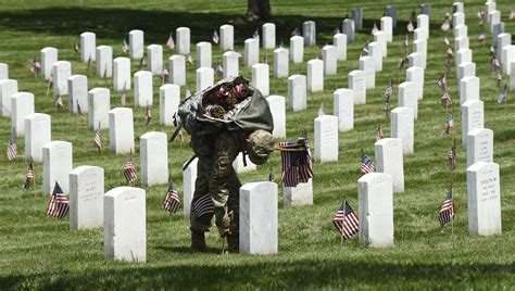 Soldiers place 230K flags in annual event at Arlington National Cemetery - WTOP News