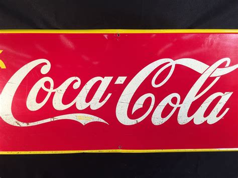 VINTAGE COCA-COLA ADVERTISING SIGN, MADE IN CANADA IN 1940 BY ST. THOMAS METAL SIGNS, LTD., 57''