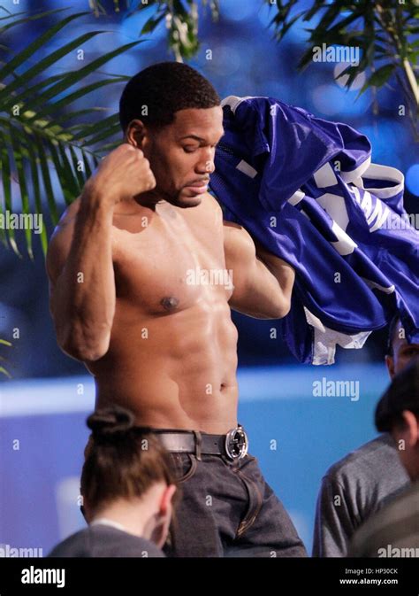 Michael Strahan shows of his body at Directv's Seventh Annual Celebrity Beach Bowl on February 2 ...