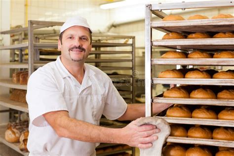 Baker In His Bakery Baking Bread Stock Photo - Image of caucasian, bakers: 26622266