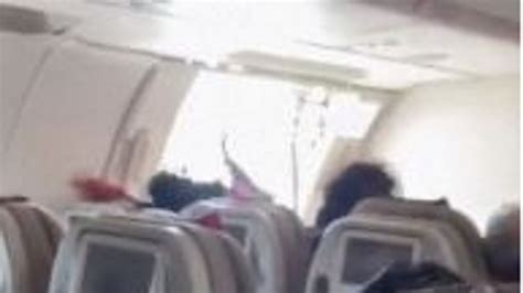 Panic and screams as passenger opens emergency plane door mid-flight ...