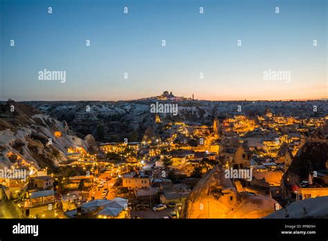 Goreme town in Cappadocia at sunset Stock Photo - Alamy