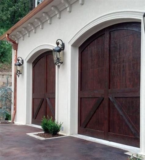 Carriage style garage doors. | Garage door design, House exterior, Wood garage doors