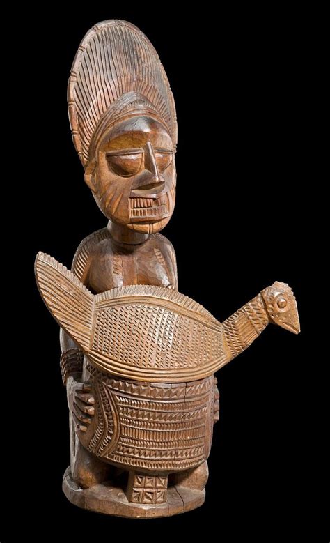 Yoruba Divination Sculpture: Woman with Chicken, 20th Century - African - Tribal