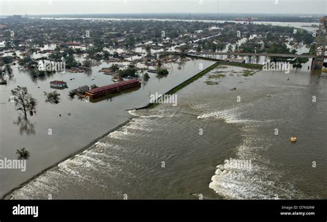 Aerial view of massive flooding and breach in levees in the aftermath of Hurricane Katrina ...