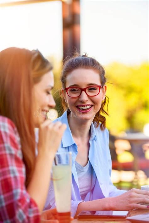 Two Smiling Female Friends Talking, Drinking Coffee Outdoors in the City Stock Image - Image of ...