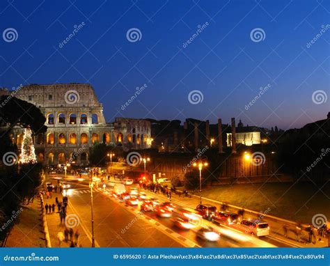 Roman Colosseum at night stock photo. Image of detail - 6595620