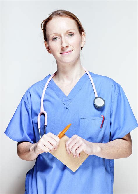 Female Doctor In Scrubs Photograph by James Whitaker - Pixels